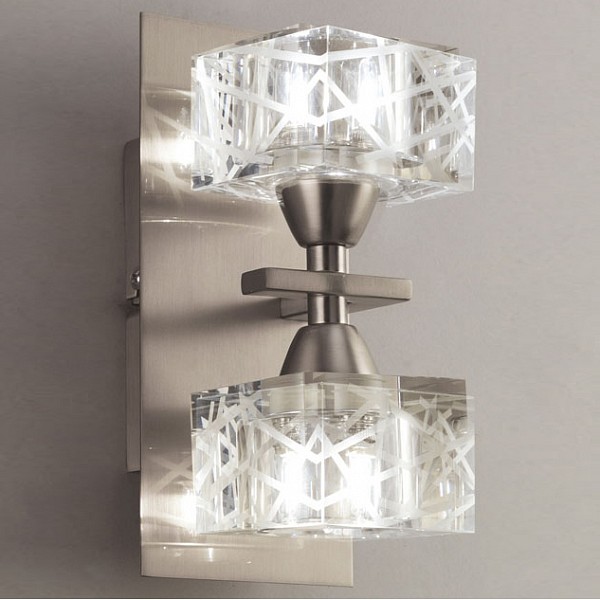 Бра MantraZen Satin Nickel 1445 Бра MantraZen Satin Nickel 1445Артикул - MN_1445,Бренд - Mantra (Испания),Серия - Zen Satin Nickel,Гарантия, месяцы - 24,Время изготовления, дней - 1,Рекомендуемые помещения - Гостиная, Кабинет, Спальня,Ширина, мм - 90,Высота, мм - 200,Выступ, мм - 113,Цвет плафонов и подвесок - неокрашенный,Цвет арматуры - никель,Тип поверхности плафонов и подвесок - прозрачный, рельефный,Тип поверхности арматуры - сатин,Материал плафонов и подвесок - стекло,Материал арматуры - дюралюминий, сталь,Лампы - галогеновая,цоколь G9; 220 В; 40 Вт,цвет: белый теплый, 2800-3200 K,Сопоставление с лампой накаливания - на 50%,Тип колбы лампы - пальчиковая,Класс электробезопасности - I,Общая мощность, Вт - 80,Лампы в комплекте - галогеновые G9,Общее кол-во ламп - 2,Количество плафонов - 2,Возможность подключения диммера - можно,Степень пылевлагозащиты, IP - 20,Диапазон рабочих температур - комнатная температура,Масса, кг - 1, 5,Дополнительные параметры - светильник предназначен для использования со скрытой проводкой<br><br>Артикул: MN_1445<br>Бренд: Mantra (Испания)<br>Серия: Zen Satin Nickel<br>Гарантия, месяцы: 24<br>Время изготовления, дней: 1<br>Рекомендуемые помещения: Гостиная, Кабинет, Спальня<br>Ширина, мм: 90<br>Высота, мм: 200<br>Выступ, мм: 113<br>Цвет плафонов и подвесок: неокрашенный<br>Цвет арматуры: никель<br>Тип поверхности плафонов и подвесок: прозрачный, рельефный<br>Тип поверхности арматуры: сатин<br>Материал плафонов и подвесок: стекло<br>Материал арматуры: дюралюминий, сталь<br>Лампы: галогеновая,цоколь G9; 220 В; 40 Вт,цвет: белый теплый, 2800-3200 K<br>Сопоставление с лампой накаливания: на 50%<br>Тип колбы лампы: пальчиковая<br>Класс электробезопасности: I<br>Общая мощность, Вт: 80<br>Лампы в комплекте: галогеновые G9<br>Общее кол-во ламп: 2<br>Количество плафонов: 2<br>Возможность подключения диммера: можно<br>Степень пылевлагозащиты, IP: 20<br>Диапазон рабочих температур: комнатная температура<br>Масса, кг: 1, 5<br>Дополнительные параметры: светильник предназначен для использования со скрытой проводкой