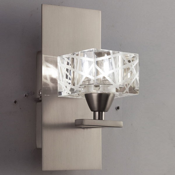 Бра MantraZen Satin Nickel 1446 Бра MantraZen Satin Nickel 1446Артикул - MN_1446, Бренд - Mantra (Испания), Серия - Zen Satin Nickel, Гарантия, месяцы - 24, Время изготовления, дней - 1, Рекомендуемые помещения - Гостиная, Кабинет, Спальня, Ширина, мм - 90, Высота, мм - 200, Выступ, мм - 113, Цвет плафонов и подвесок - неокрашенный, Цвет арматуры - никель, Тип поверхности плафонов и подвесок - прозрачный, рельефный, Тип поверхности арматуры - сатин, Материал плафонов и подвесок - стекло, Материал арматуры - дюралюминий, сталь, Лампы - галогеновая, цоколь G9; 220 В; 40 Вт, цвет: белый теплый, 2800-3200 K, Сопоставление с лампой накаливания - на 50%, Тип колбы лампы - пальчиковая, Класс электробезопасности - I, Лампы в комплекте - галогеновая G9, Общее кол-во ламп - 1, Количество плафонов - 1, Возможность подключения диммера - можно, Степень пылевлагозащиты, IP - 20, Диапазон рабочих температур - комнатная температура, Масса, кг - 1, Дополнительные параметры - светильник предназначен для использования со скрытой проводкой<br><br>Артикул: MN_1446<br>Бренд: Mantra (Испания)<br>Серия: Zen Satin Nickel<br>Гарантия, месяцы: 24<br>Время изготовления, дней: 1<br>Рекомендуемые помещения: Гостиная, Кабинет, Спальня<br>Ширина, мм: 90<br>Высота, мм: 200<br>Выступ, мм: 113<br>Цвет плафонов и подвесок: неокрашенный<br>Цвет арматуры: никель<br>Тип поверхности плафонов и подвесок: прозрачный, рельефный<br>Тип поверхности арматуры: сатин<br>Материал плафонов и подвесок: стекло<br>Материал арматуры: дюралюминий, сталь<br>Лампы: галогеновая,цоколь G9; 220 В; 40 Вт,цвет: белый теплый, 2800-3200 K<br>Сопоставление с лампой накаливания: на 50%<br>Тип колбы лампы: пальчиковая<br>Класс электробезопасности: I<br>Лампы в комплекте: галогеновая G9<br>Общее кол-во ламп: 1<br>Количество плафонов: 1<br>Возможность подключения диммера: можно<br>Степень пылевлагозащиты, IP: 20<br>Диапазон рабочих температур: комнатная температура<br>Масса, кг: 1<br>Дополнительные параметры: светильник предназначен для использования со скрытой проводкой